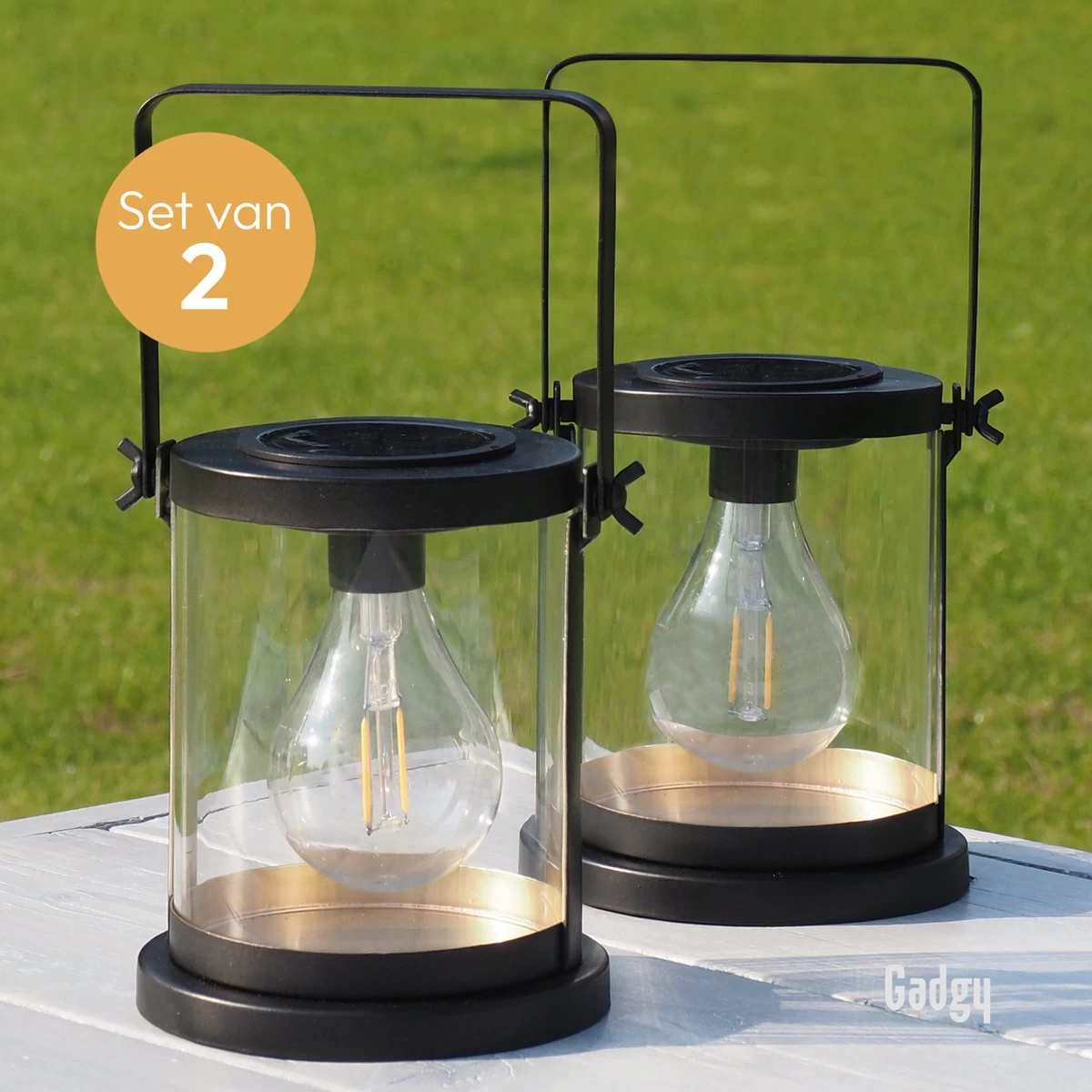 Gadgy Solar Lantaarn Glas Met Led Gloeilamp - Tafellamp Set Van 2 - Solar Tuinverlichting Op Zonneenergie - Led Buitenverlichting Met Dag/Nacht Sensor - Tuinlantaarn - 16.5x14.5CM 9 Gadgy Solar Lantaarn Glas Met Led Gloeilamp - Tafellamp Set Van 2 - Solar Tuinverlichting Op Zonneenergie - Led Buitenverlichting Met Dag/Nacht Sensor - Tuinlantaarn - 16.5x14.5CM - Afbeelding 7